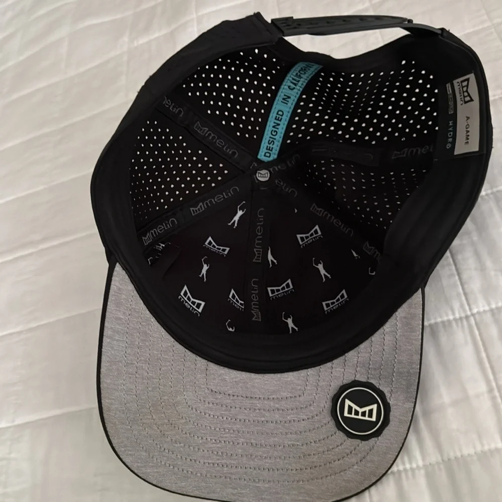 Melin Brand Black Trucker Logo Cap